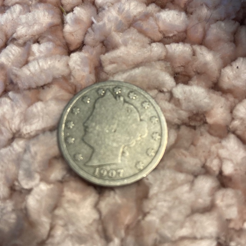 1907 nickle rare, good shape, great for your collection.